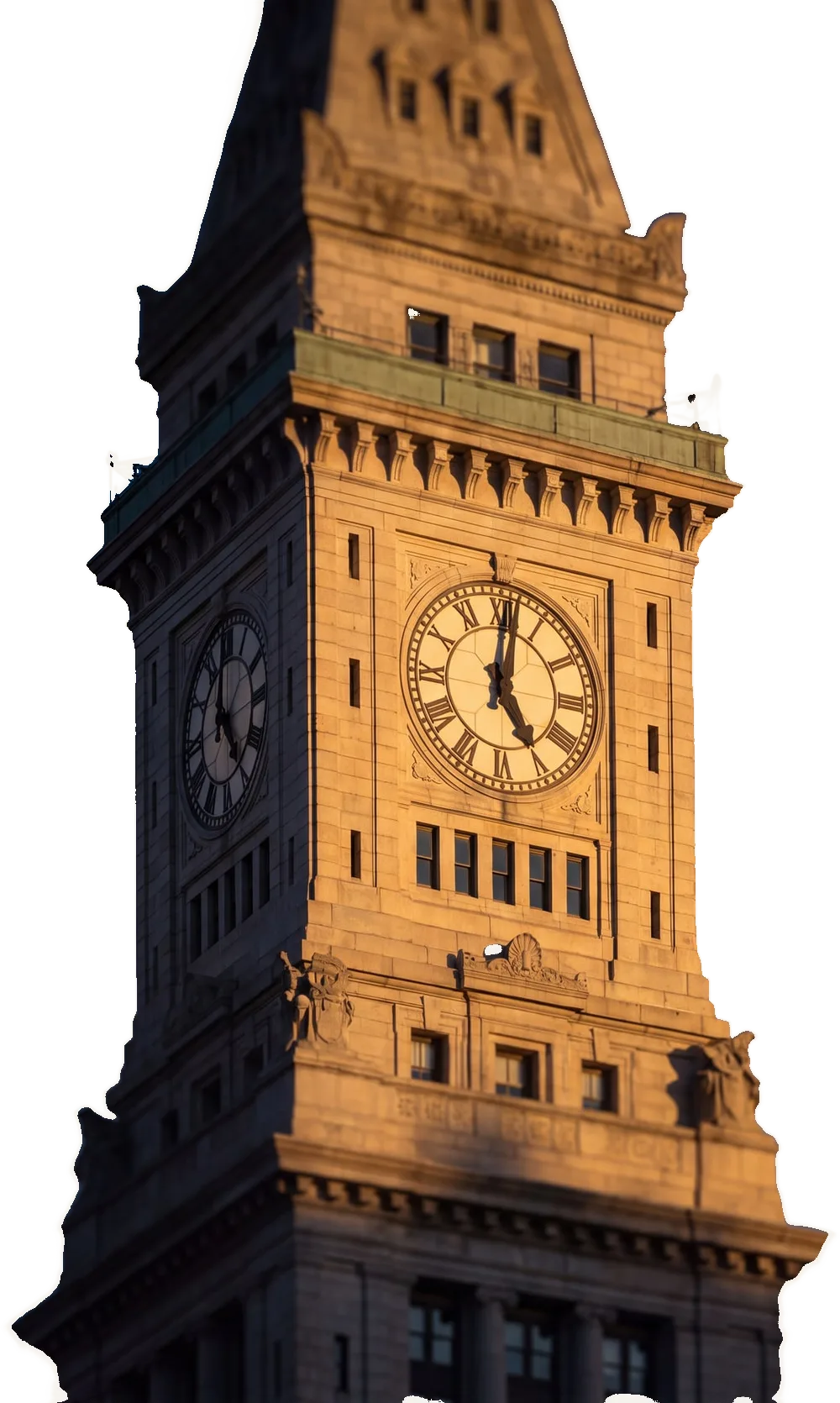 The clock of the Custom House Tower in Boston, lit by the last of the sun